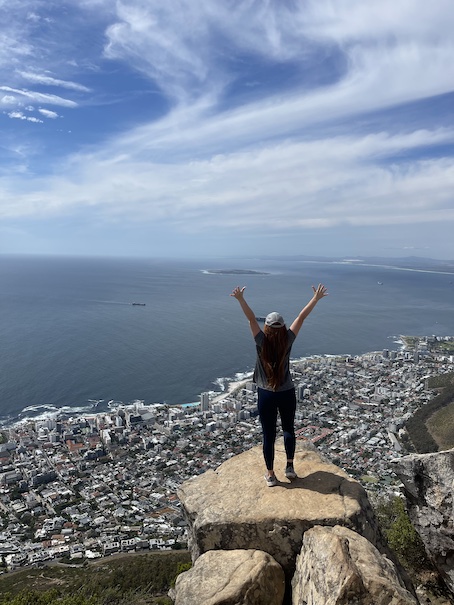 Hannah at Lion's Head standing over Sea Point