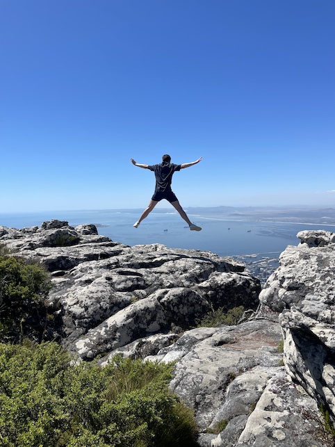 Liam jumping on Table Mountain