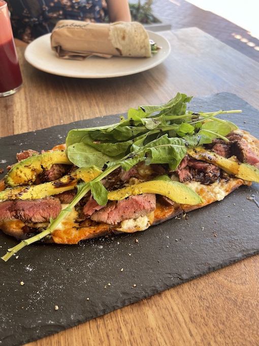 Open steak flatbread at Vagabond Kitchen