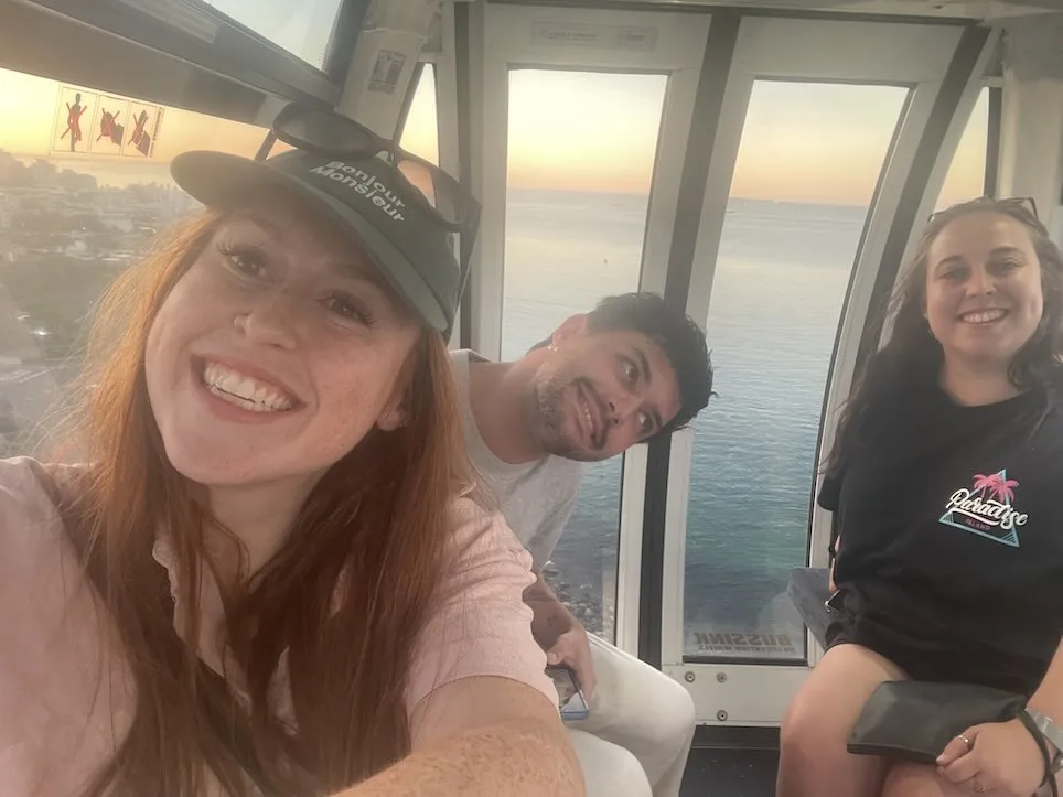 Hannah Will and Stacey on the Cape Wheel at sunset