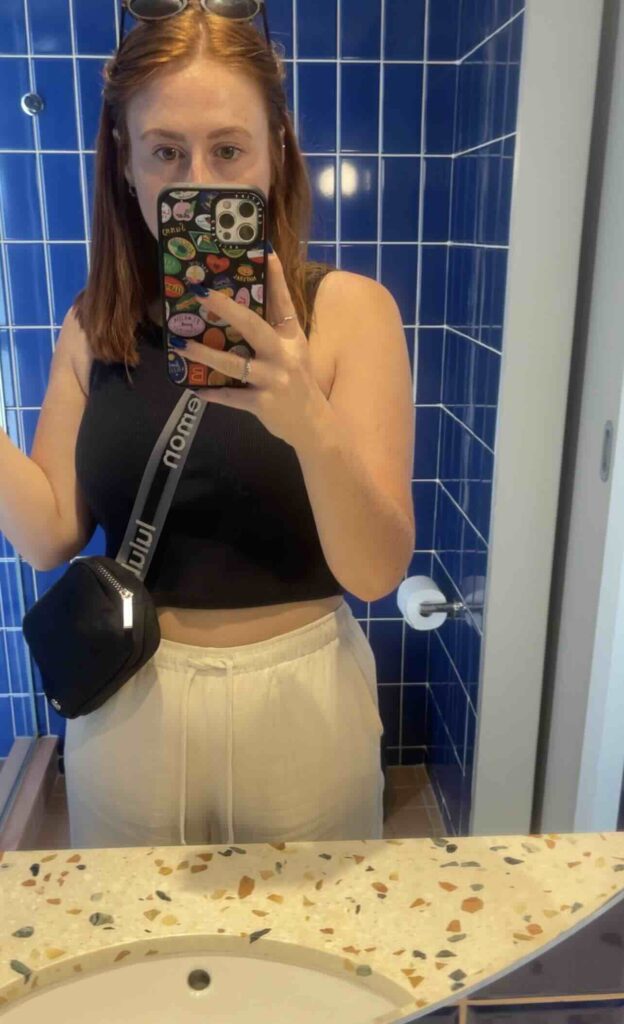 Hannah mirror selfie with Lululemon belt bag