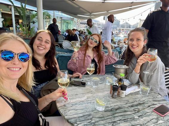 Girls drinking wine at the Waterfront