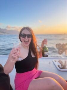 Hannah at sunset on a cruise