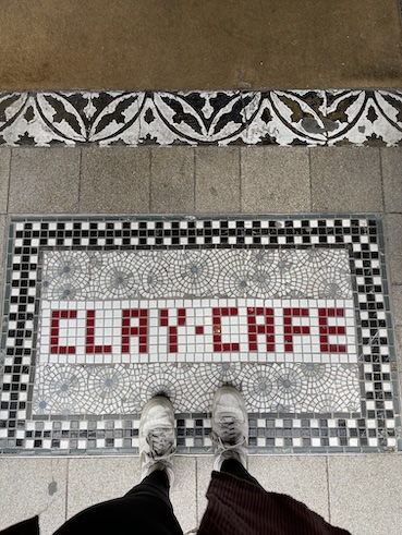 Entrance mat at Clay Cafe