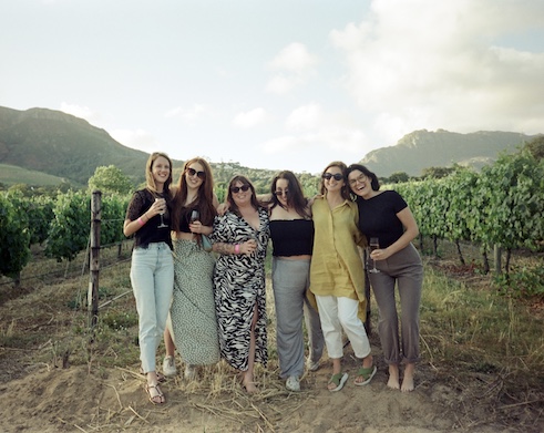 Film photo of girls in vineyard at Klein Constantia