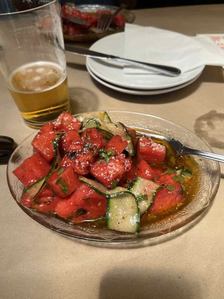 The Watermelon salad at Blondie, Cape Town, featuring a beer in the background