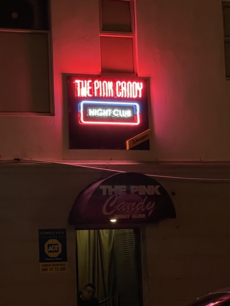 The neon sign outside the Pink Candy nightclub