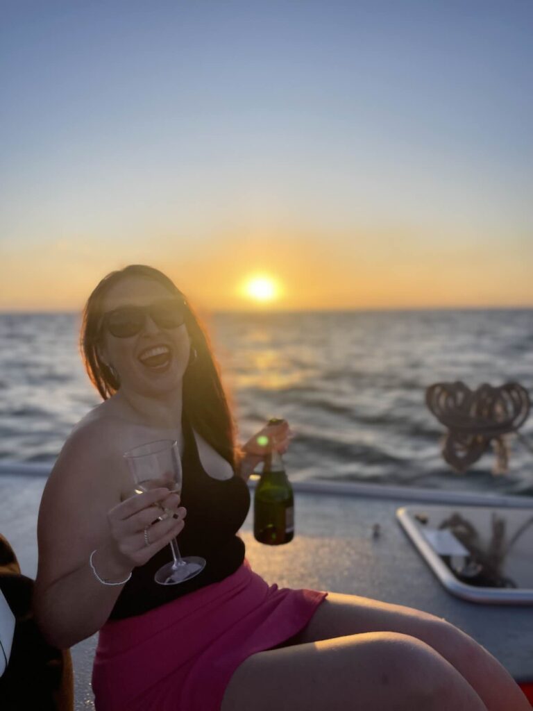 Hannah laughing on champagne cruise