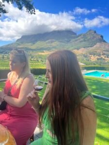 Hannah smelling wine at Le Pommier, Franschhoek