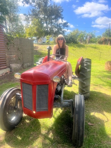 Hannah on tractor at Eikendal, Stellenbosch