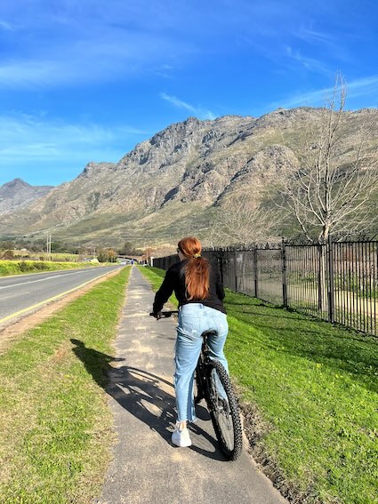 Hannah on a bike in Stellenbosch