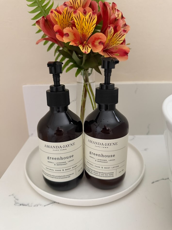 Amanda Jayne toiletries in the bathroom at Eikendal Lodge