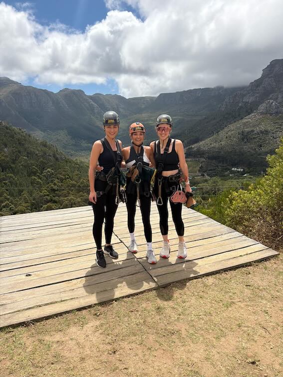 Hannah, Sophie, Georgia on the zipline platform in Constantia