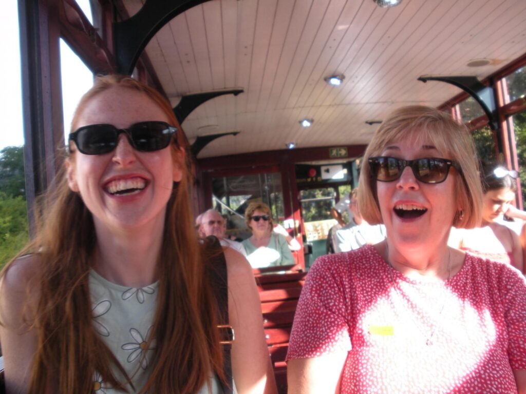 Hannah and Mum on the wine tram laughing